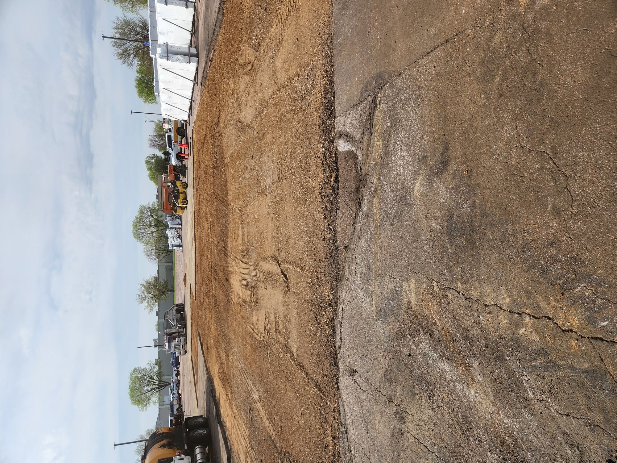 Asphalt milling removing damaged surface
