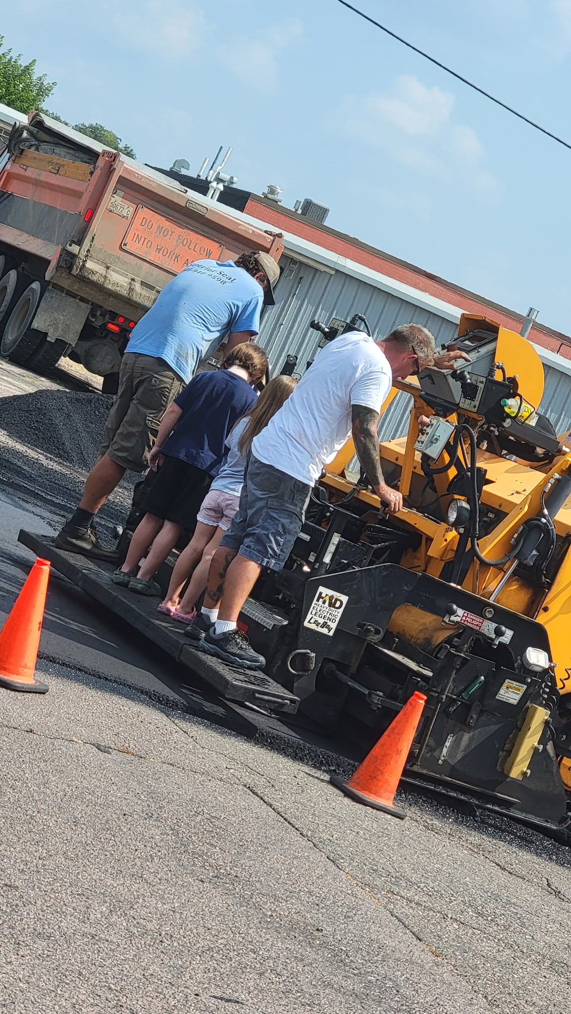 Sealed asphalt surface, deep black finish